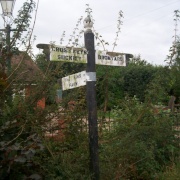 Intriguing little fingerpost outside a farm on a country road near Bromyard, Herefordshire