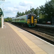 The Leeds To Blackpool train rushes through Oswaldtwistle Station