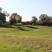 Mounds in the grass which indicate the site of the old village of Churchill