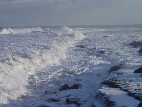 A Filey version of a white Christmas. Breakers crash onto Filey Brigg in this Boxing day scene 2001