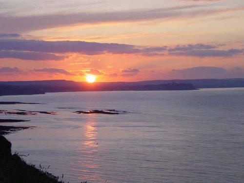 The sunset of June 24th 2003, taken from the north cliffs in the great field at Filey