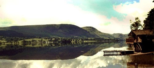 Mirror smooth Lake Ullswater, Cumbria.