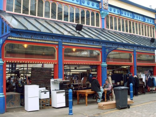 Discussing business, outside the Open Market, Huddersfield.