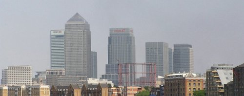 The Tower of Canary Wharf and its Six Grey Dwarfs