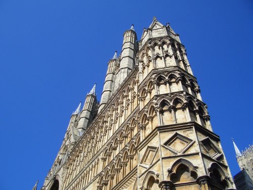 The imense and detailed front face of Lincoln Cathedral.