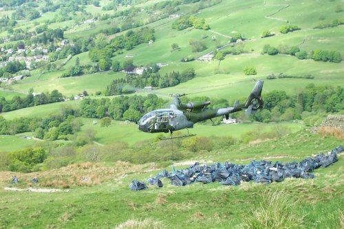 Helping to repair footpaths on Wansfell, Windermere, Cumbria