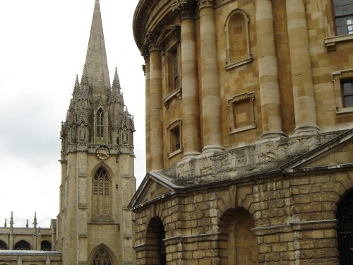 Bodleian Library foreground and the University Church of St. Mary the Virgin, Oxford