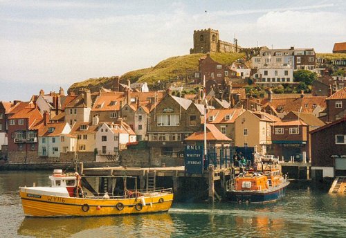 Whitby Life Boat Station overlooked by the parish church of St. Mary. Whitby, North Yorkshire