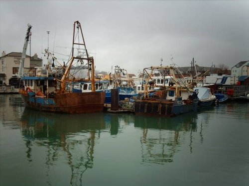 Fishing Boats moored at Old Portsmouth docks.