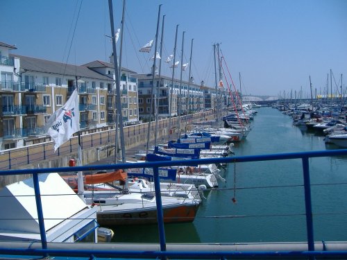 view from the foot bridge crossing Brighton Marina