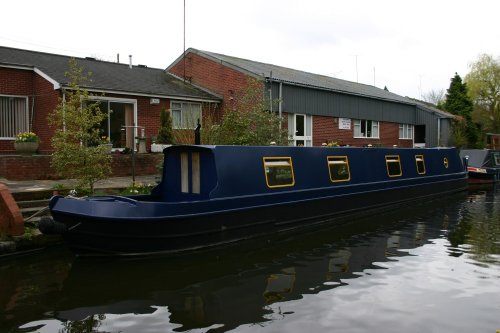 a barge at one of Wolverhampton canals, part between compton and tettenhall road