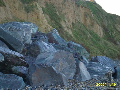 Granite boulders placed to stem erosion of the sea cliffs at East Runton, Norfolk