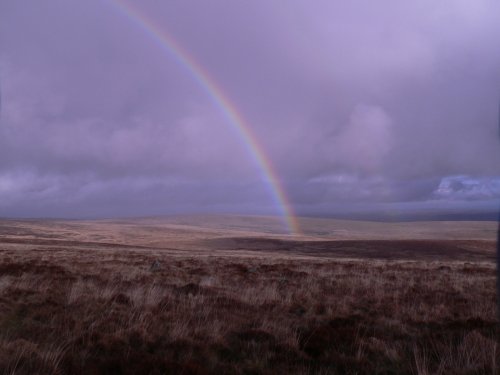 Rainbow over Rue Lake Pits, on Dartmoor, Devon.