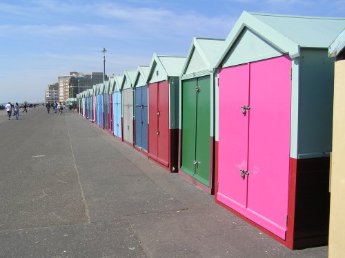 Colourful beach huts on the sea front at Hove, East Sussex