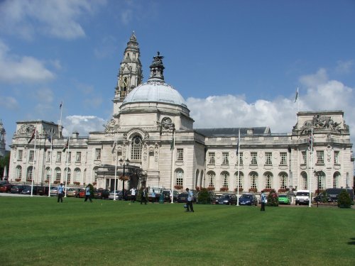 Cardiff city hall fronted by its lawn
