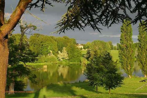 Blenheim Palace grounds view across the 'Queen Pool' towards Woodstock from the Column