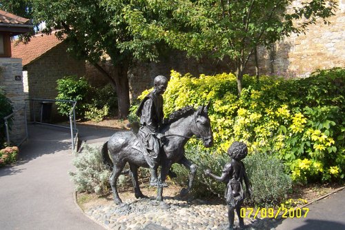 Bronze sculpture in the grounds of Glastonbury Abbey, Somerset