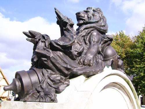 Lion on top of the War Memorial in the Market Square, Salisbury, Wiltshire