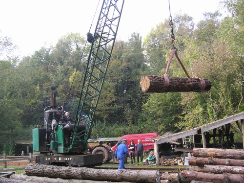 The steam crane at Amberley lifts a log