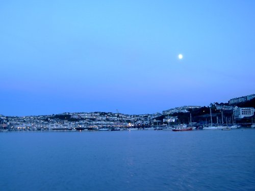 Brixham harbour at dusk.