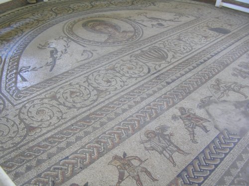 Venus and cherub gladiator mosaics at Bignor roman villa