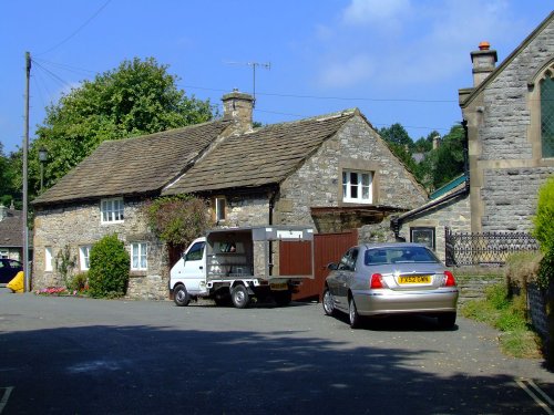 Little stone cottage near the church, Ashford in the water