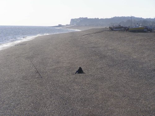 Lone fisherman on Deal beach.