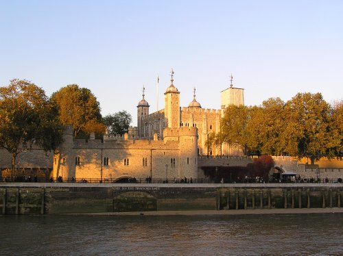 The Tower of London with traitor's gate seen from the river in evening light