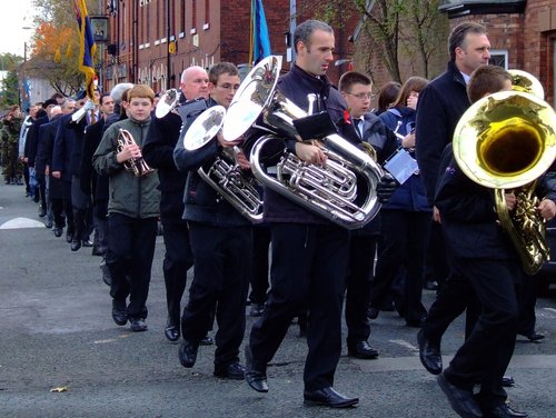 The precession led by the band