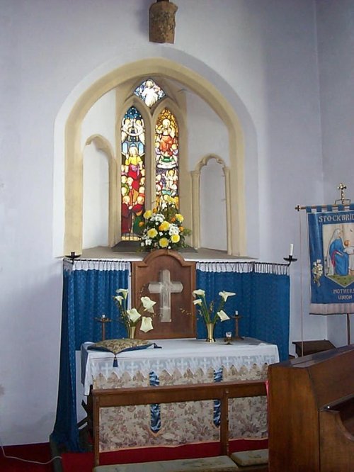 Side Altar and stained glass window St Peters Church