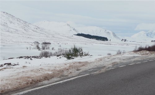 Loch Droma covered with ice and snow