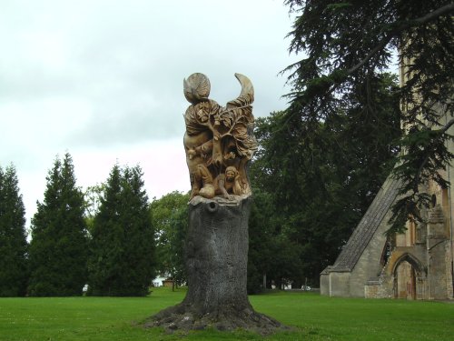 Two sided felled tree sculpture