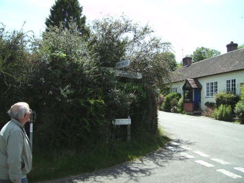 Rural road directional signpost