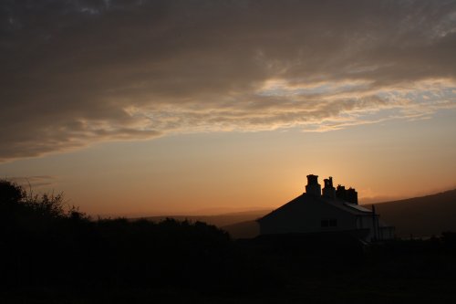 Dramatic sky over the coastguard houses