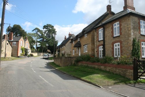 The main street in Ravenstone looking up towards the Church.