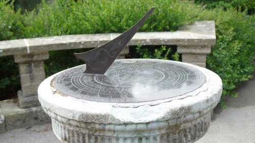 A sun dial near the house