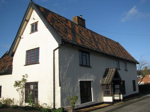 Patterned tiles on a Mendham house.