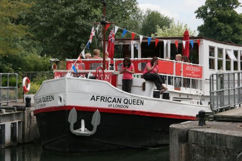 The 'African Queen' Cruise Boat negotiates  Mapledurham Lock