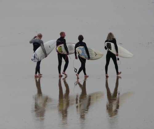 Surfers on Fistral Beach, Newquay.