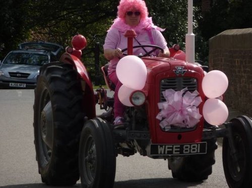 Tractor girls fund raiser for breast cancer