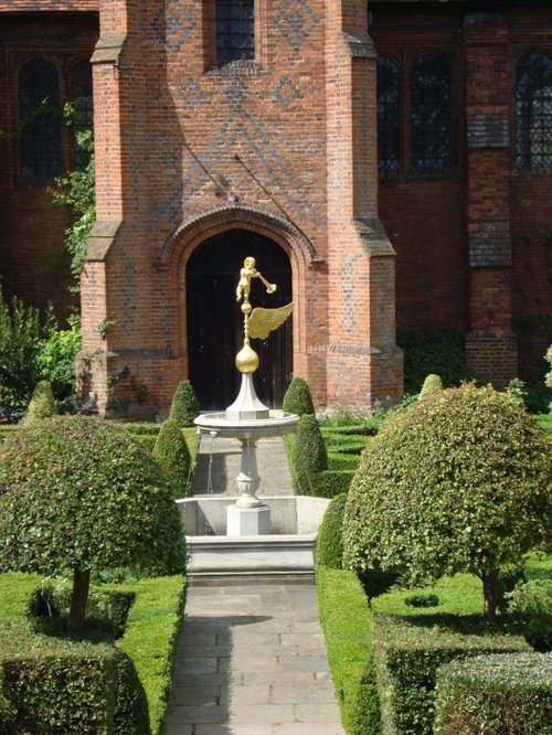 Gilded cherub on top of the Knot Garden fountain