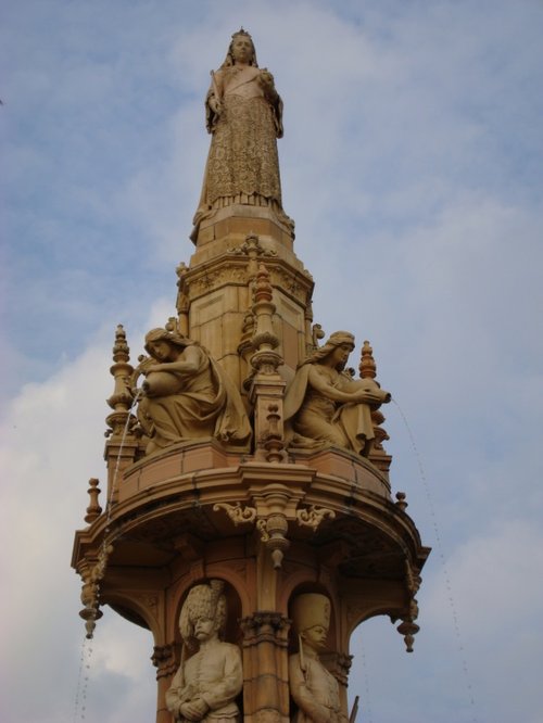 Statue of Queen Victoria at the Doulton Fountain top.