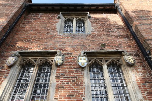 Ewelme, Shields on wall of Ewelme Church of England Primary School