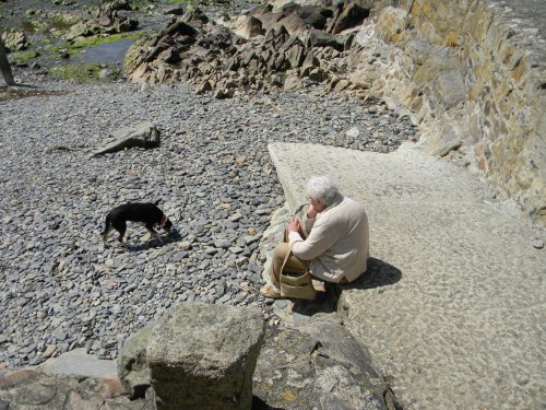 Lady resting at Port Quin