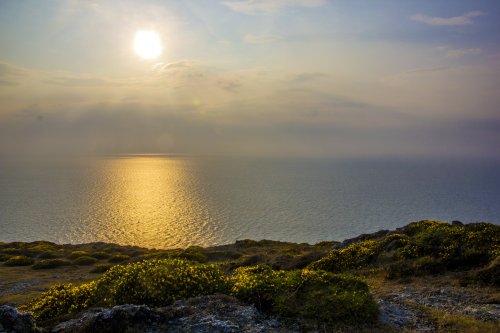 Setting sun over the sea from Mynydd Mawr near Aberdaron