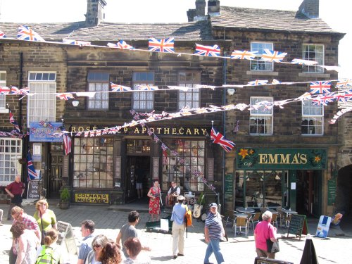 Buskers outside the apothecary in Haworth