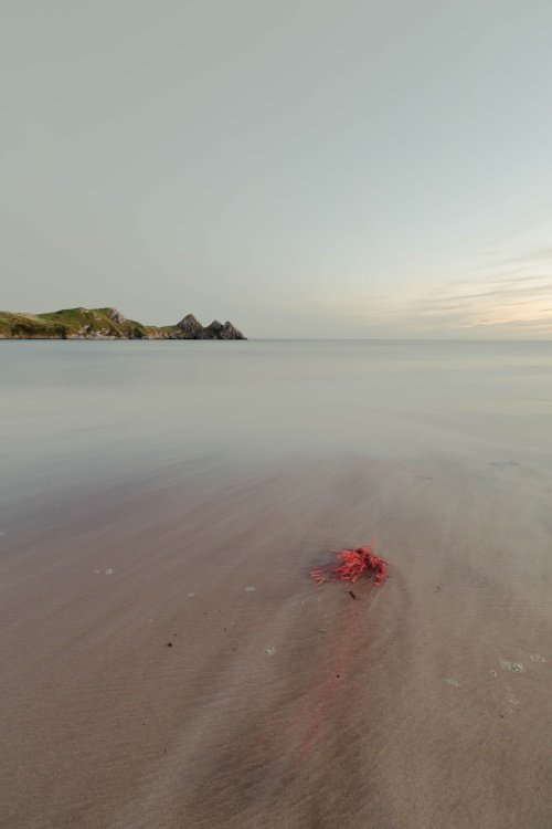 three cliffs bay Penmaen