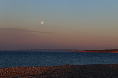 Sunrise and Moonset over Budleigh Salterton