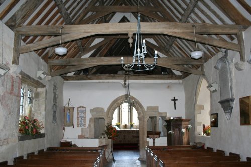 The interior of St. Nicholas' Church, Baulking (Note the wall paintings)