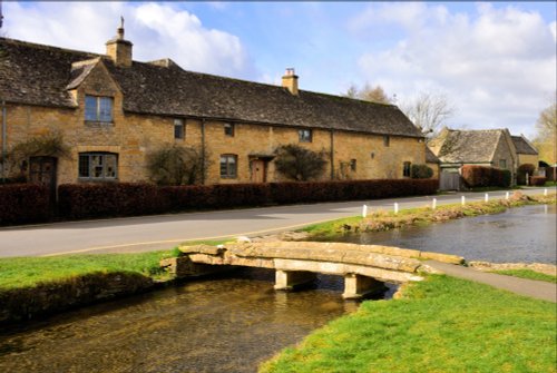 The Old Stone Footbridge Over the River Eye in Lower Slaughter